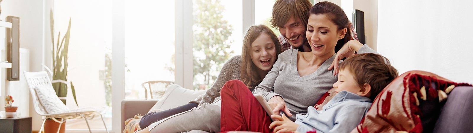 Family looking at tablet